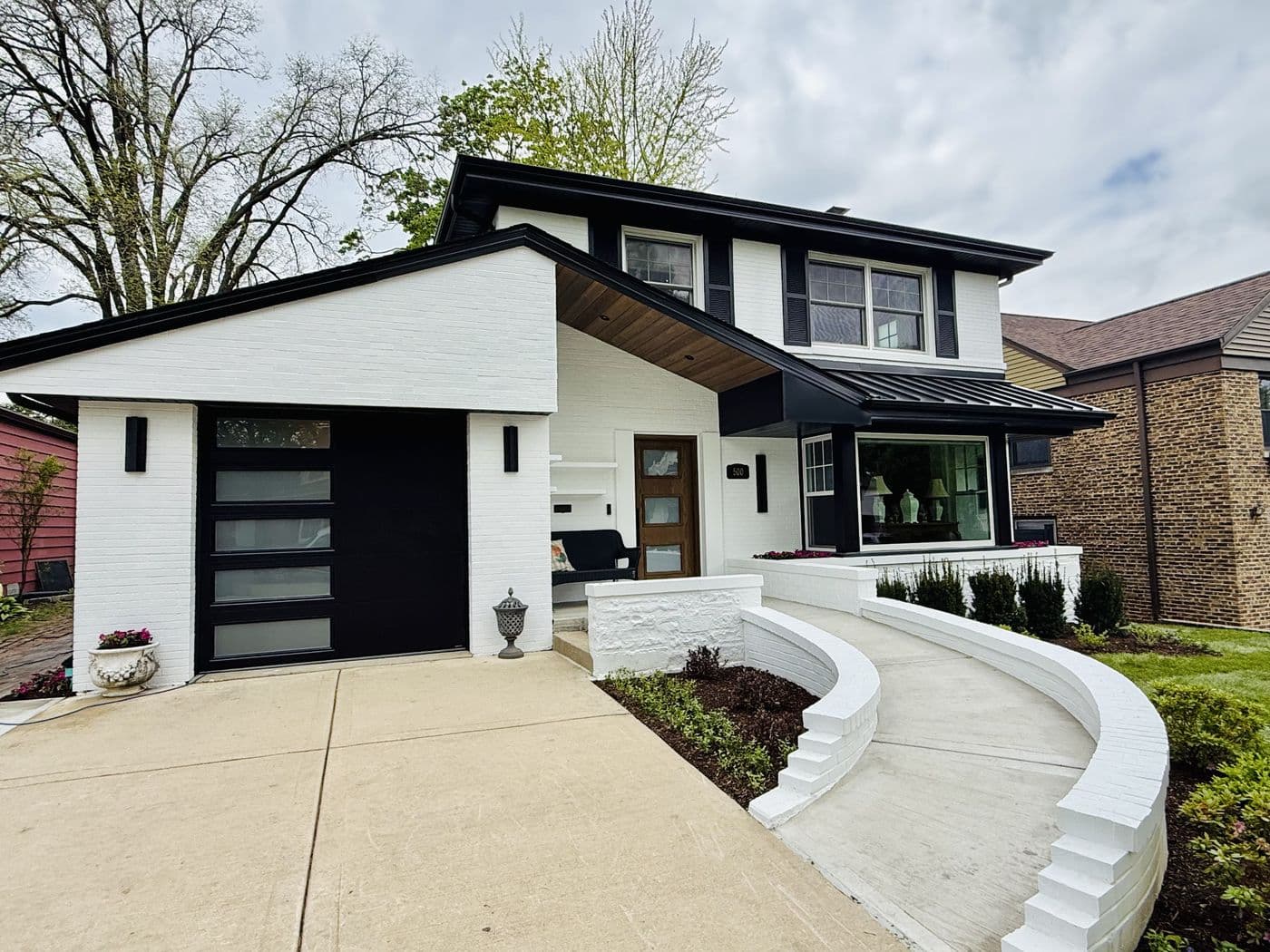 Rebuilt front elevation with new entry and walk